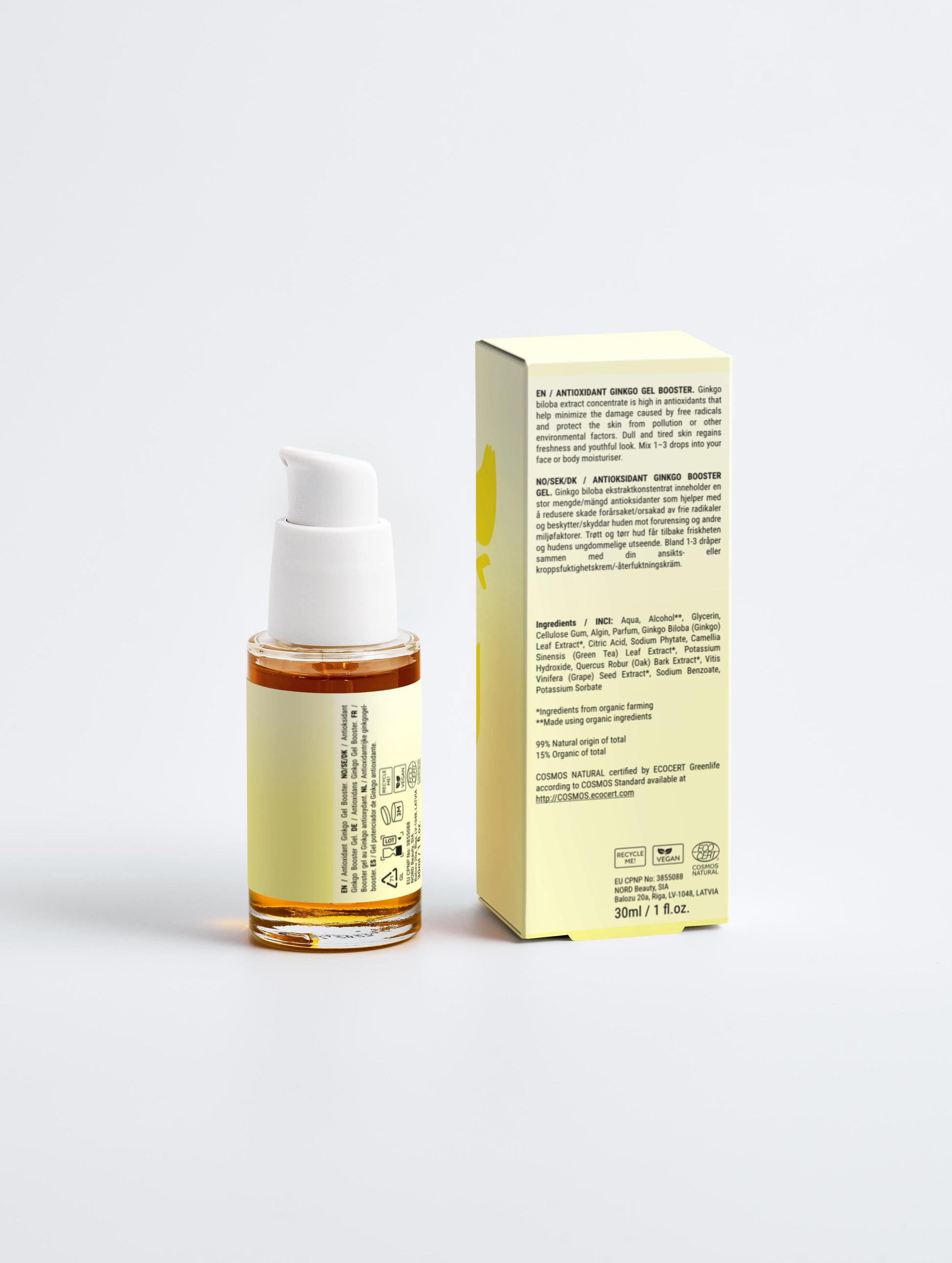 Skincare serum bottle with packaging on a light gray background