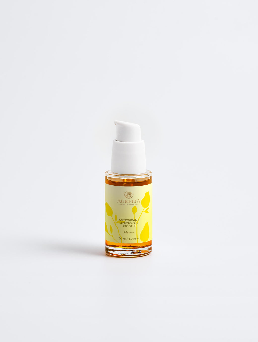 Skincare serum bottle with yellow label on a white background