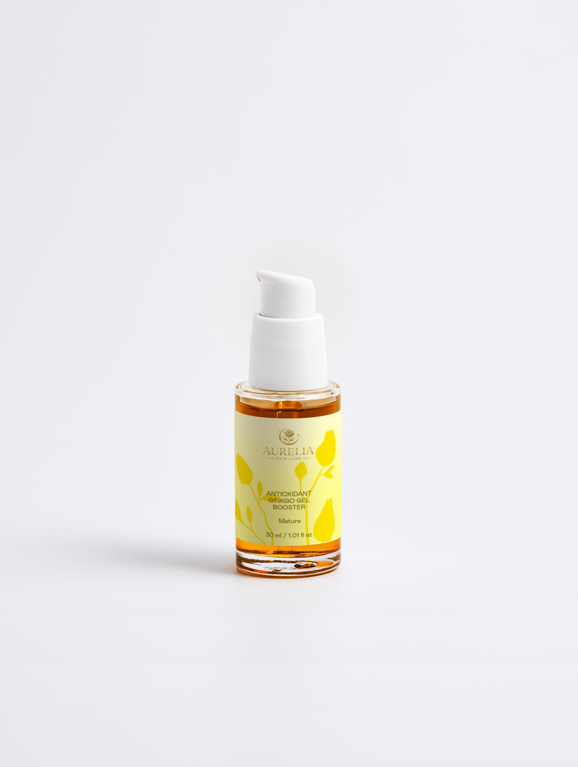 Skincare serum bottle with yellow label on a white background
