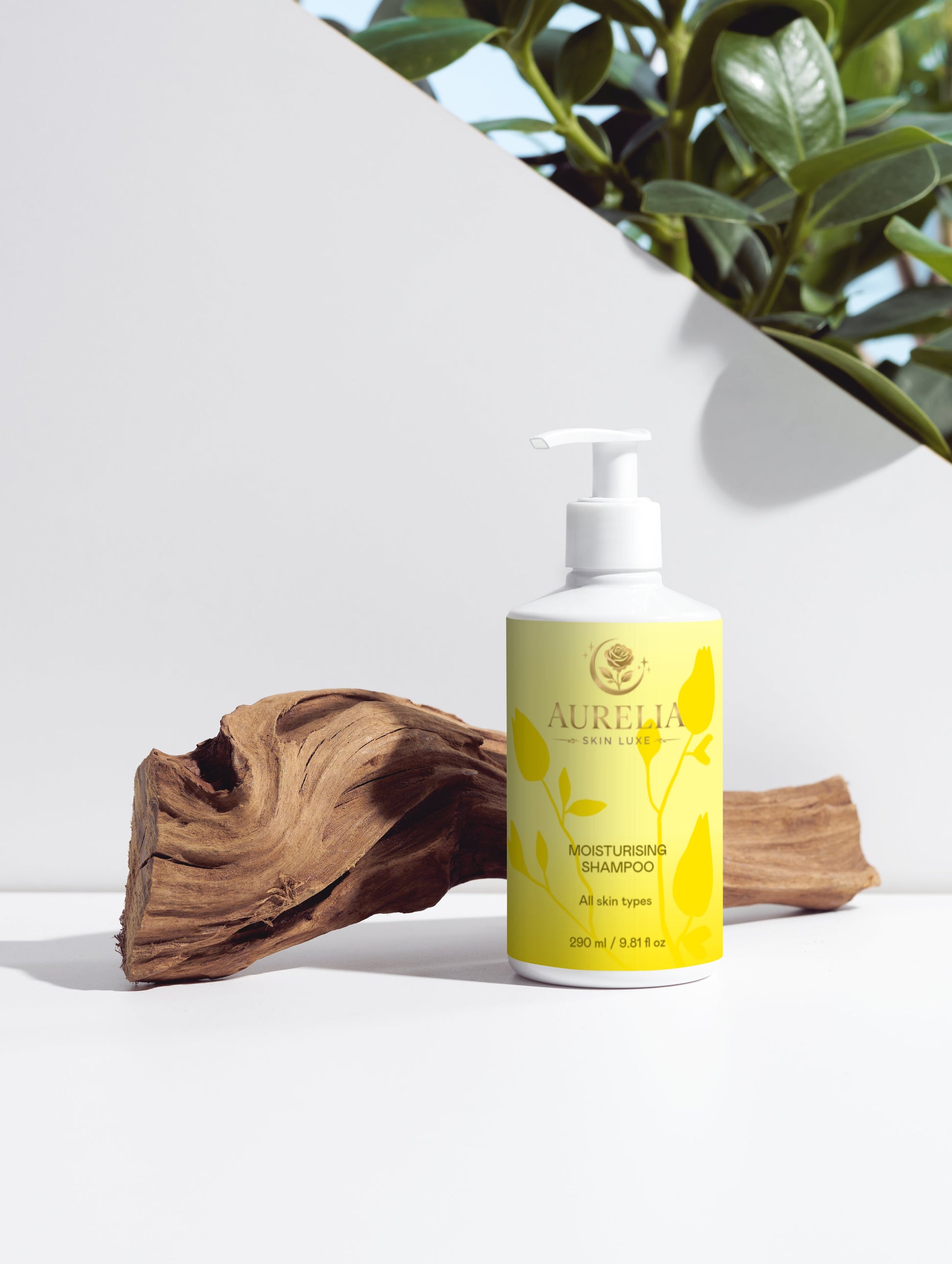 Yellow bottle of 'Chosen one' skincare product on a white surface with a plant in the background